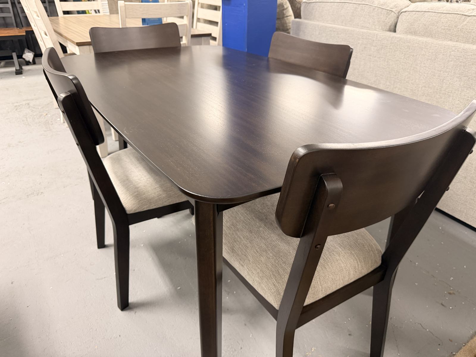 Dark wood dining table and chairs