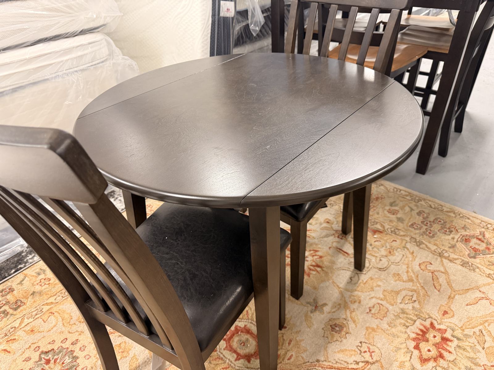 Round dining table with chairs