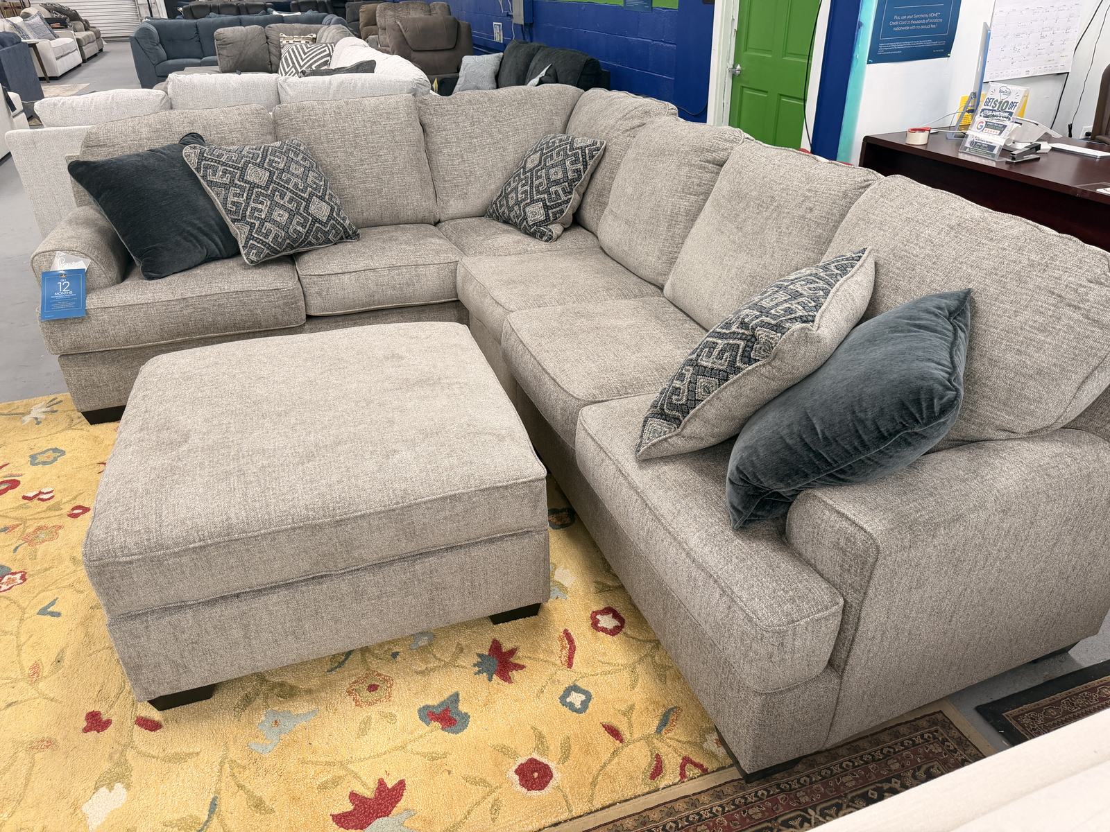 Sectional with tray-top ottoman
