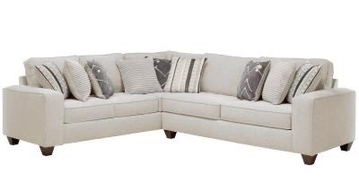 Cream sectional with chaise in a living room setting