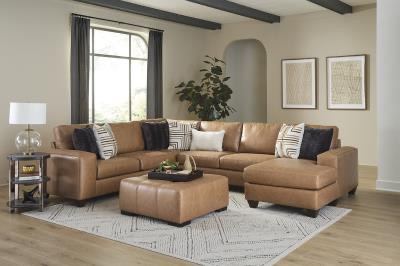 Tan leather sectional with ottoman