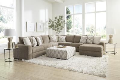 Taupe sectional with round ottoman